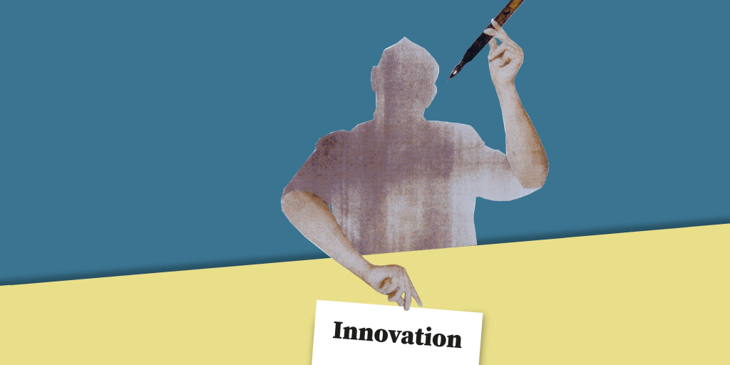 Person holds a sign with the word innovation and a fountain pen in the air